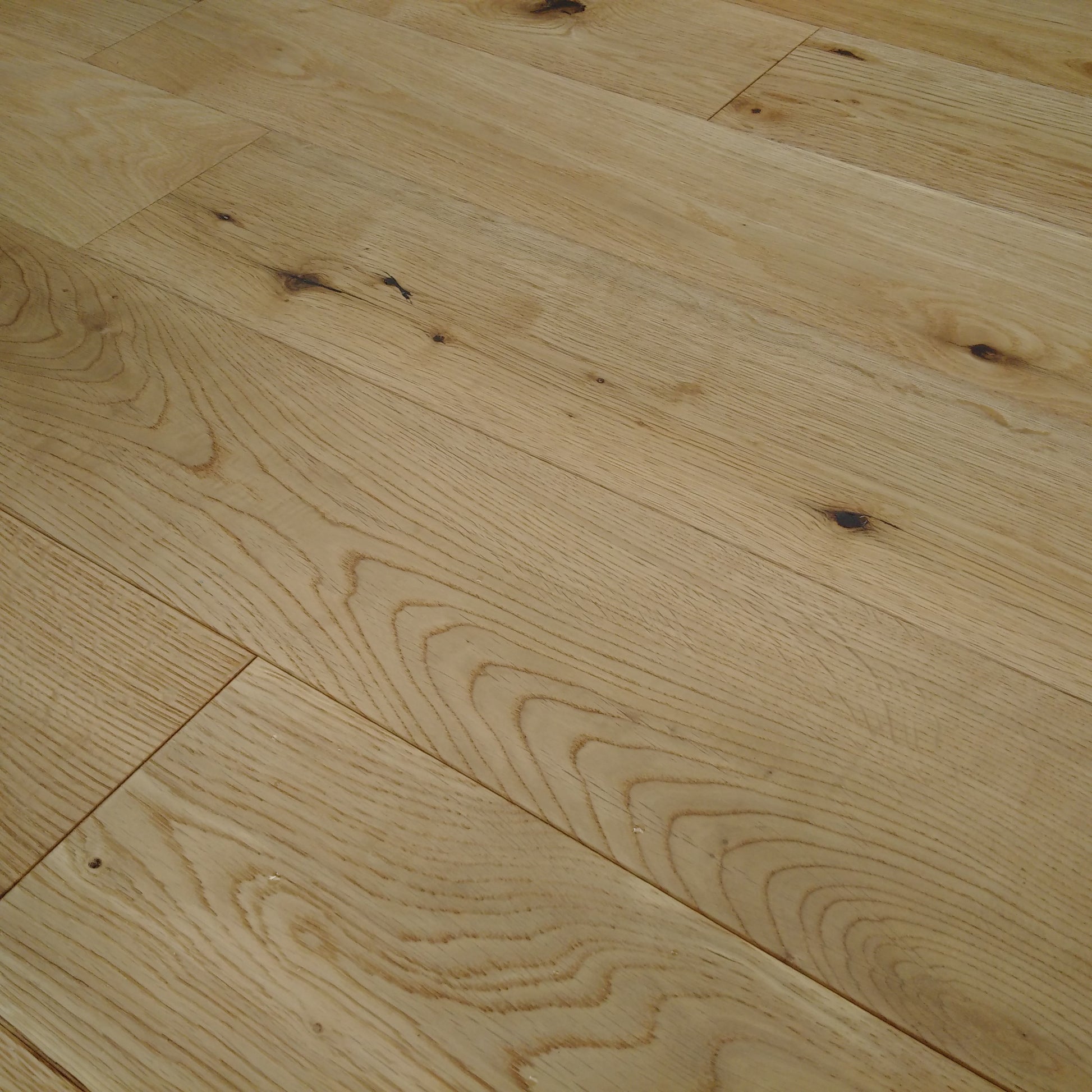 ⤓: 14mm ↔: 125mm ↕: 300-1200mm Natural Engineered Oak